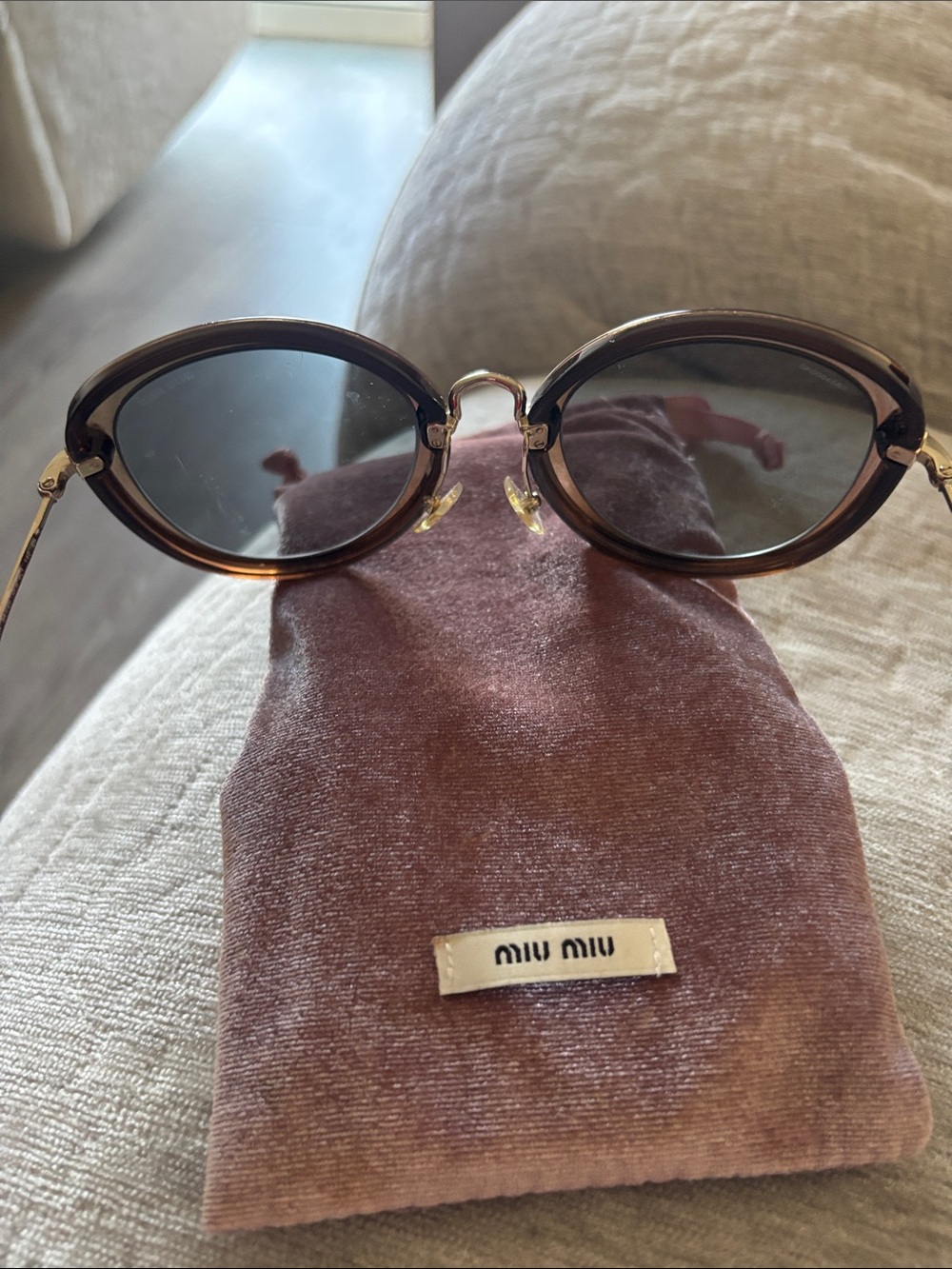 Miu Miu Round Tortoiseshell Frame Sunglasses with Dark Lenses - Picture 4 of 4